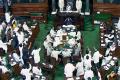 Oppn protests continue in LS; House adjourns for 2 hrs - Sakshi Post