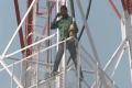 Warangal farmer climbs a mobile-tower, threatens to jump - Sakshi Post