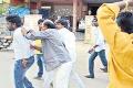 BJP leaders assault protesting students - Sakshi Post