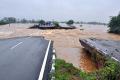 Flood Water Breaches National Highway, Traffic Stranded - Sakshi Post