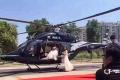 Traffic was held up to land the helicopter on a busy street in Shanghai - Sakshi Post