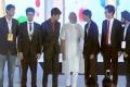 Prime Minister Narendra Modi with a team of young engineering students, who developed the PMO app,&amp;amp;nbsp;from Delhi Technical University. - Sakshi Post