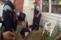 Chicago police on Friday released a video of shooting an unarmed African American teenager on July 28. - Sakshi Post