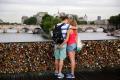 In a latest trend, couples demonstrate their love by putting padlocks to bridges on the serene Seine river, which the French government thinks is ruining the heritage.&amp;amp;nbsp; - Sakshi Post