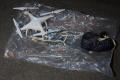 The seized drone and drugs. - Sakshi Post