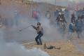 The striking miners hurling stones at the security personnel. - Sakshi Post