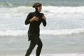 Around 30 coastal resorts have recently banned women from wearing the full-body swimwear on their beaches, although France’s highest administrative court on Friday overturned the measure in one town - Sakshi Post