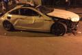 The mangled BMW car after the tragic accident. - Sakshi Post