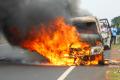 Flames engulf the Scorpio vehicle on the highway in Ungaturu on Tuesday. - Sakshi Post