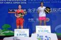 P V Sindhu with the China Open 2016 trophy and (left) the runner up Sun Yu of China. - Sakshi Post