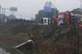 Rescue workers pulling out the ill-fated bus from the pond in Hubei province, on Friday. - Sakshi Post