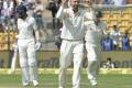 Off-spinner Nathan Lyon, after taking the wicket of KL Rahul during the second Test match between India and Australia in Bengaluru on Saturday. - Sakshi Post