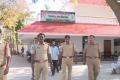 Police officials return empty handed from the YSRCP office in Kadapa on Saturday. - Sakshi Post