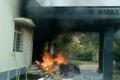 Unidentified persons damaged office and torched the chilli stock at the Khammam Agricultural Market Yard. - Sakshi Post