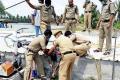 Police extracting the bodies of the aqua farm workers in Mogaltur (file photo) - Sakshi Post