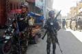 Afghan forces at the site of an attcak - Sakshi Post