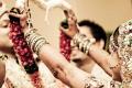 The NRI grooms, majority of them from IT industry, marry here in India and divorce their wives in the USA and the UK. (Representational image) - Sakshi Post