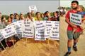 Over&amp;amp;nbsp;200 walkers carrying placards participated in a one-km walk on Sunday - Sakshi Post