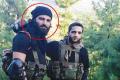 Sabzar Ahmad Bhat (L) with slain Hizbul leader Burhan Wani (File photo) - Sakshi Post