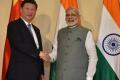 Chinese President Xi Jinping and Prime Minister Narendra Modi - Sakshi Post