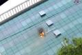 Fire emanating from one of the windows of the Star MAA TV office building, in Hyderabad on Tuesday.&amp;amp;nbsp; - Sakshi Post