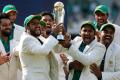 Pakistan players wearing white jackets over their green jersies enjoy their moment lifting ICC Champions 2017 Trophy after beating India with a 180-run victory at  The Oval in south London on Sunday.  &amp;amp;nbsp; - Sakshi Post