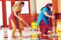 Kriti Kharbanda mops a  floor at a Gurudwara, in London - Sakshi Post