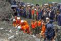 A side of a mountain collapsed following the landslide burying 62 homes. About 120 people were feared to be buried. - Sakshi Post