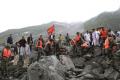 Some 40 homes in the village of Xinmo were swallowed by the cascading debris after the side of a mountain collapsed - Sakshi Post