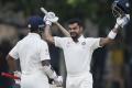 India skipper Virat Kohli exulting after he hit his 17th Test hundred - Sakshi Post