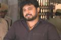 Tollywood actor Tanish Alladi addresses media persons outside Abkari Bhavan on Monday. - Sakshi Post