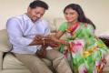 YS Sharmila tied a rakhi on the wrist of her brother and YSRCP chief YS Jagan Mohan Reddy - Sakshi Post