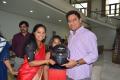 TRS MP K Kavitha on Monday tied rakhi and gifted her brother and Telangana Minister for Industries and IT K T Rama Rao a helmet to promote road safety. - Sakshi Post