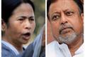 TMC chief Mamata Banerjee and (right) Mukul Roy - Sakshi Post