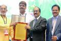 Union minister of state for tourism Alphons Kannanthanam presents  civic management of a tourist destination award to 
GHMC commissioner B. Janardhan Reddy in New Delhi&amp;amp;nbsp; - Sakshi Post