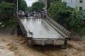 Floods and landslides have killed at least 54 people in Vietnam and left another 39 missing since a tropical depression hit the country - Sakshi Post