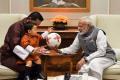 PM Narendra Modi meets with Bhutan’s Jigme Khesar Namgyel Wangchuck and his son - Sakshi Post