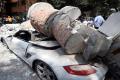 A debris of a building fell on the car after Mexico city was hit by quake&amp;amp;nbsp; - Sakshi Post