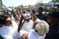 A farmer tying head gear for YS Jagan&amp;amp;nbsp; - Sakshi Post