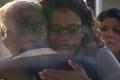 Donald’s manager hugs one of the victim’s relatives - Sakshi Post