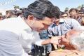 AP Leader of the Opposition, YS Jagan interacts with an old woman in Thimmarajupalle in Chittoor district - Sakshi Post