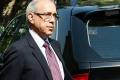 Nripendra Misra was seen on Saturday sitting in his car outside Justice Misra’s residence in New Delhi. - Sakshi Post