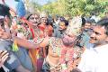 A person in the guise of Lord Hanuman clicks a selfie with YS Jagan near Rayalacheruvu. - Sakshi Post