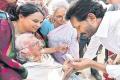 AP Leader of the Opposition, YS Jagan lending a patient ear at Thirumanyam, to 102 year-old Kanthamma, who said that she had no ration card and had not been getting her pension - Sakshi Post