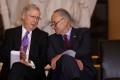 US Senate Majority Leader Mitch McConnell (left) chats with Senate Minority Leader Chuck Schumer - Sakshi Post