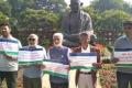 YSR Congress members protested near Mahatma Gandhi statue in Parliament house complex raising slogans demanding ‘justice’ for Andhra Pradesh. - Sakshi Post