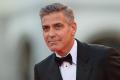 George Clooney and his human rights lawyer wife Amal have pledged USD 500,000 to help fund a US student march on Washington demanding gun control reforms - Sakshi Post