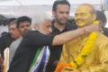 YSRCP MP Vijaysai Reddy garlanding Dr YS Rajashekara Reddy statue before starting the Deception Day Protest in Visakhapatnam - Sakshi Post