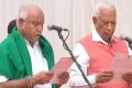 BS Yeddyurappa was administered the oath of office and secrecy by Governor Vajubhai Vala at a ceremony at Raj Bhavan - Sakshi Post