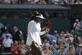 Serena Williams celebrates defeating Kristina Mladenovic in their womens singles match of the Wimbledon Tennis Championships - Sakshi Post